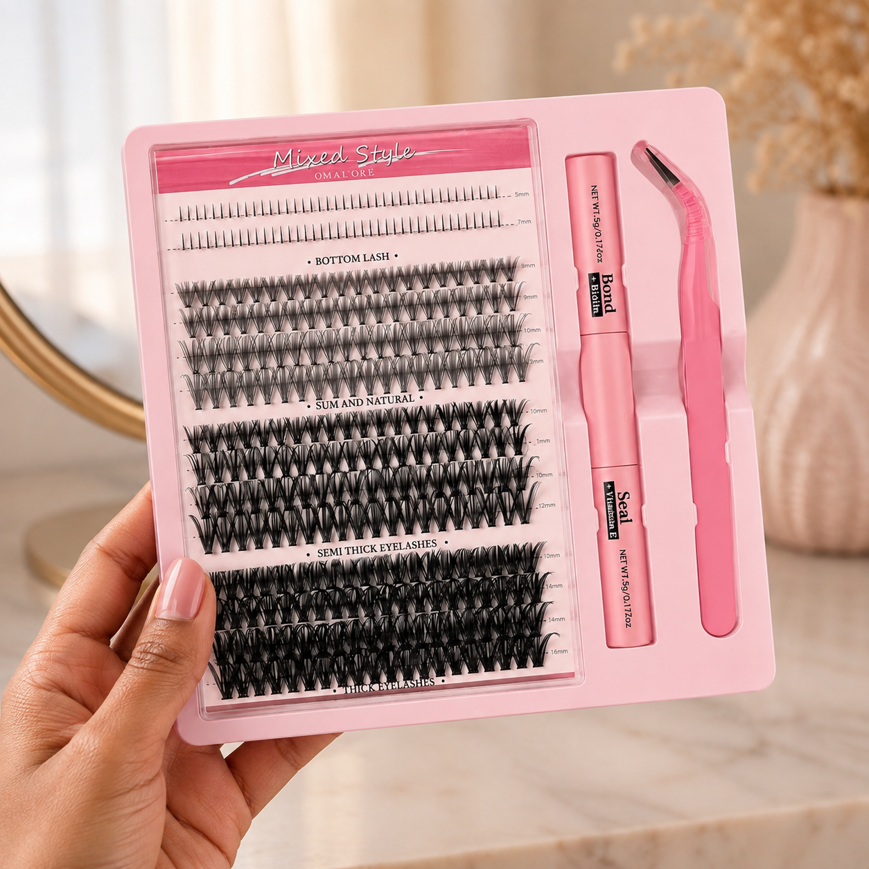 The Lash Edit kit held in hand